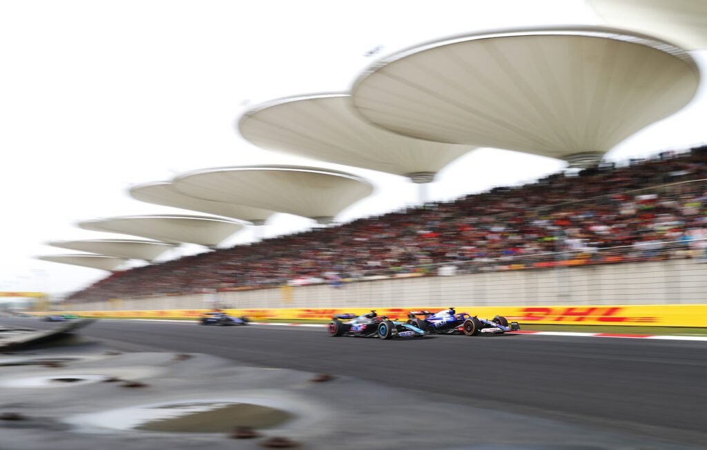 SHANGHAI, CHINA - APRIL 21: Daniel Ricciardo of Australia driving the (3) Visa Cash App RB VCARB 01 leads Esteban Ocon of France driving the (31) Alpine F1 A524 Renault on track during the F1 Grand Prix of China at Shanghai International Circuit on April 21, 2024 in Shanghai, China, Chinese Grand Prix
