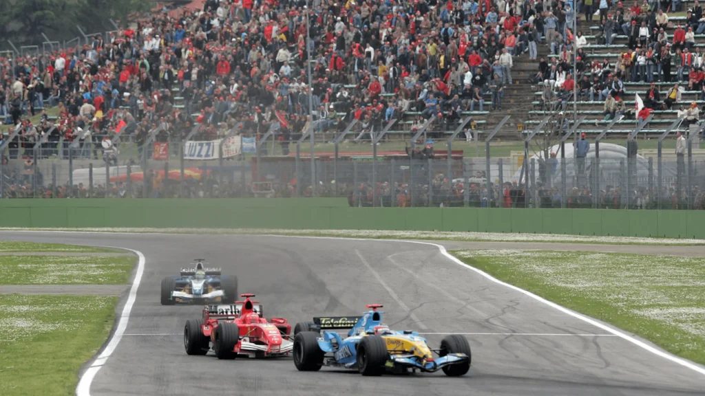 Fernando Alonso battles Michael Schumacher at the 2005 San Marino GP [Photo Credit: Alpine  F1 Team]