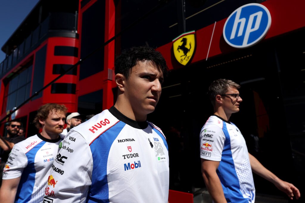 Isack Hadjar of France and Visa Cash App Racing Bulls looks on in the Paddock prior to the F1 Grand Prix of Emilia-Romagna at Autodromo Internazionale Enzo e Dino Ferrari on May 18, 2025 in Imola, Italy.