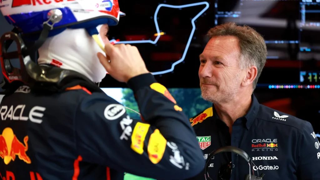 Max Verstappen of the Netherlands and Oracle Red Bull Racing and Christian Horner, Team Principal of Oracle Red Bull Racing talk in the garage prior to the F1 Grand Prix of Emilia-Romagna at Autodromo Internazionale Enzo e Dino Ferrari on May 18, 2025 in Imola, Italy. (Photo by Mark Thompson/Getty Images)